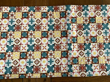 Load image into Gallery viewer, Patterned fabric with geometric design on a wooden surface