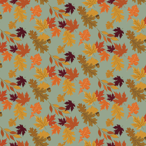 Pattern of autumn leaves on a light green background