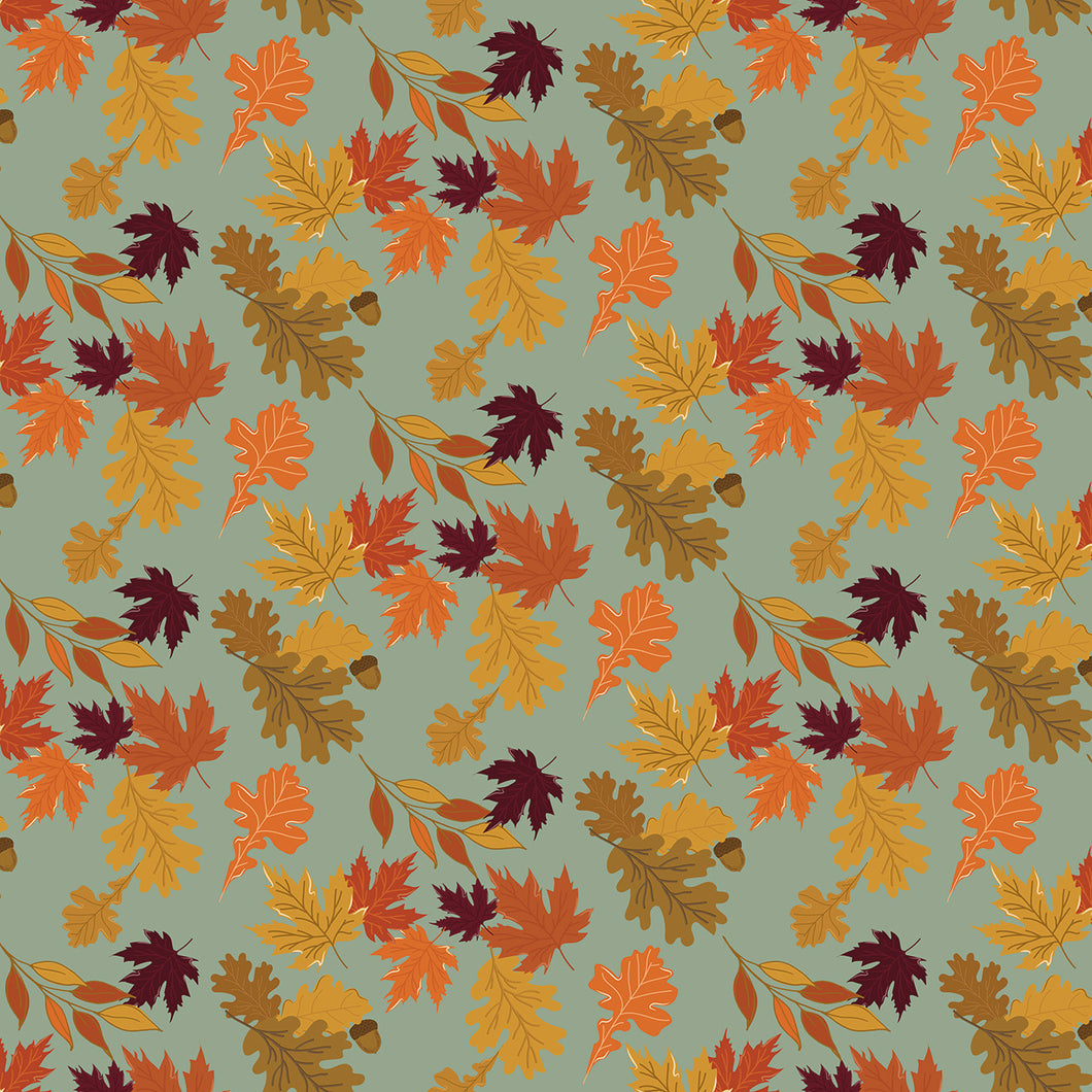 Pattern of autumn leaves on a light green background