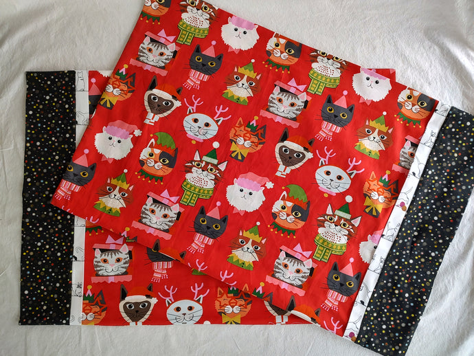 A variety of pillowcases with different designs and fabrics displayed side by side.