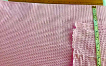 Load image into Gallery viewer, Pink waffle weave fabric on a white background
