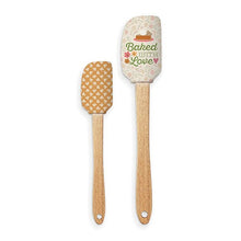 Load image into Gallery viewer, Two spatulas with wooden handles and decorative silicone heads on a white background.
