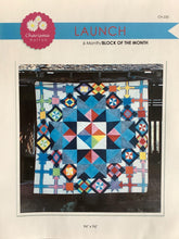 Load image into Gallery viewer, Colorful quilt with geometric pattern featuring Charisma Horton branding.
