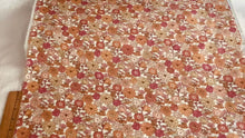Load and play video in Gallery viewer, Creamsicle Floral Cotton Lawn Print from Robert Kaufman fabrics
