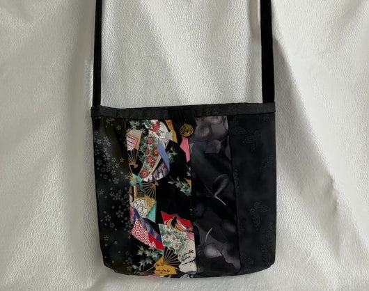 Zipped pocket shoulder tote