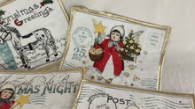 Load and play video in Gallery viewer, Reversible Victorian Christmas postcard placemats gold highlights set of six
