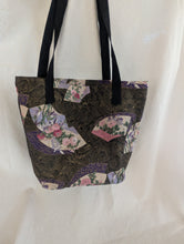 Load image into Gallery viewer, Black, gold, multicolor, gusseted tote bag or iPad sleeve or purse, key fob and interior pocket purple cranes
